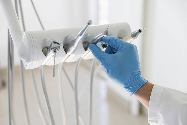 Professional Invisalign Clear Aligners technician working in Sloan, NY